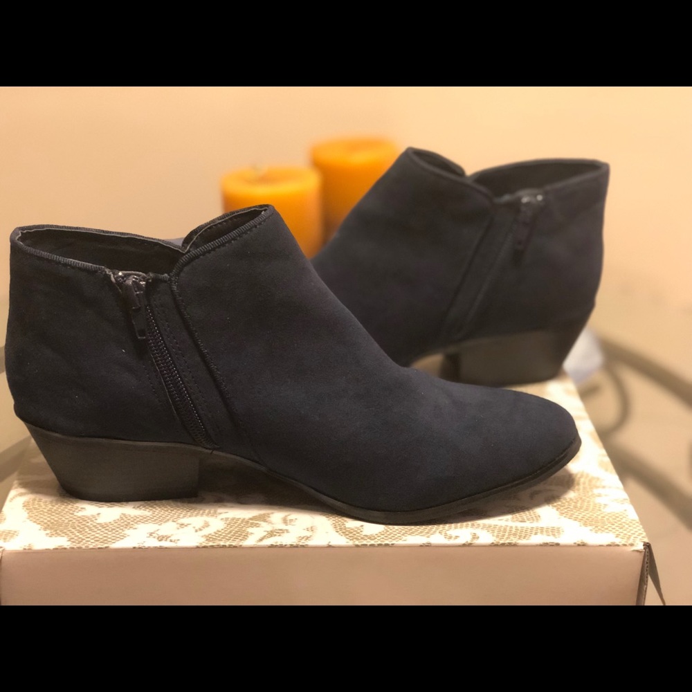 Navy blue faux suede women’s ankle boots.